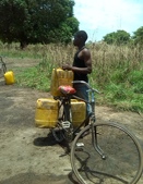 A man at Mtwara region collecting water on bike