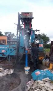 Drilling the bore hole in Murumba Village project partly funded by African Palms selling palm crosses