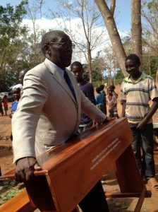 Desk arriving at Masasi village, project funded by African Palms selling palm crosses