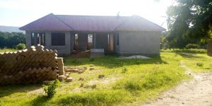 New building of Chidya health centre at south Tanzania, for Masasi people, project funded by African Palms, selling palm crosses